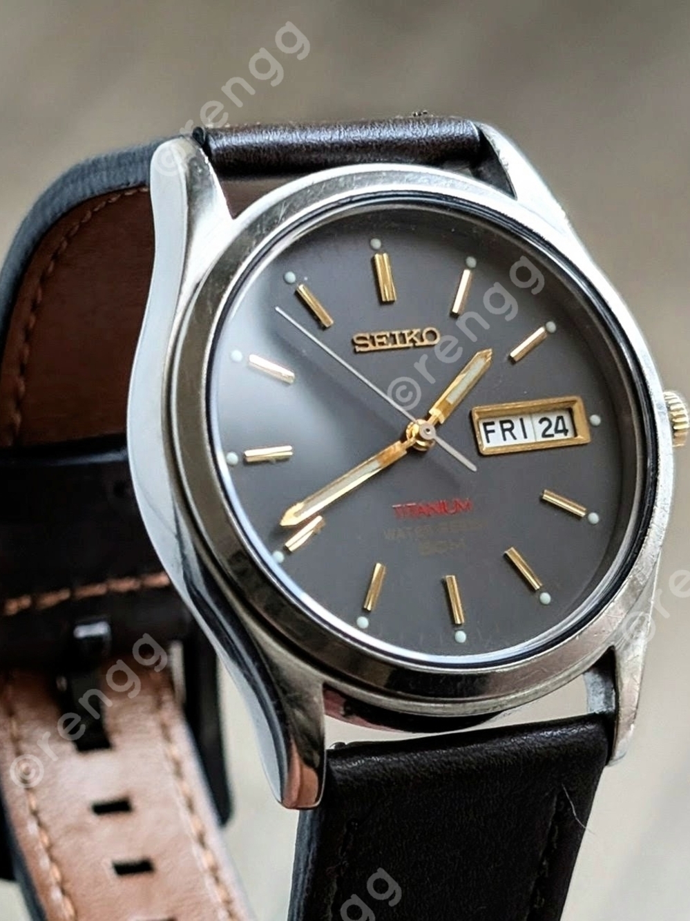Vintage Seiko Titanium Gray with Gold Accents 36mm Sapphire Crystal Great